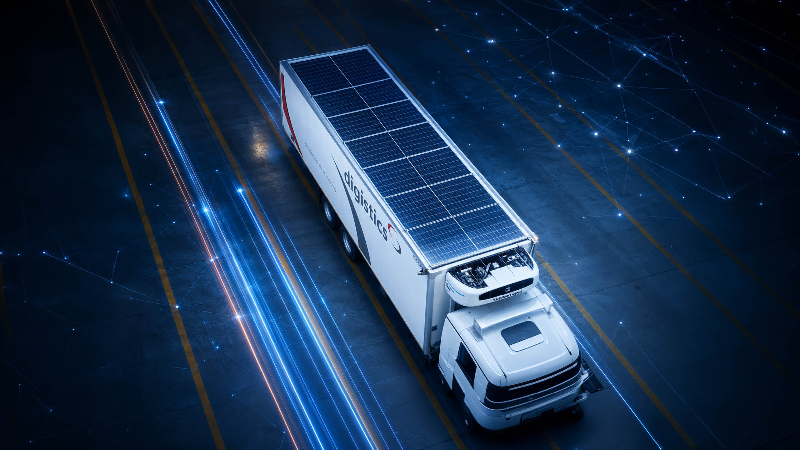 A Digistics refrigerated trailer seen from above, solar panels covering its roof.