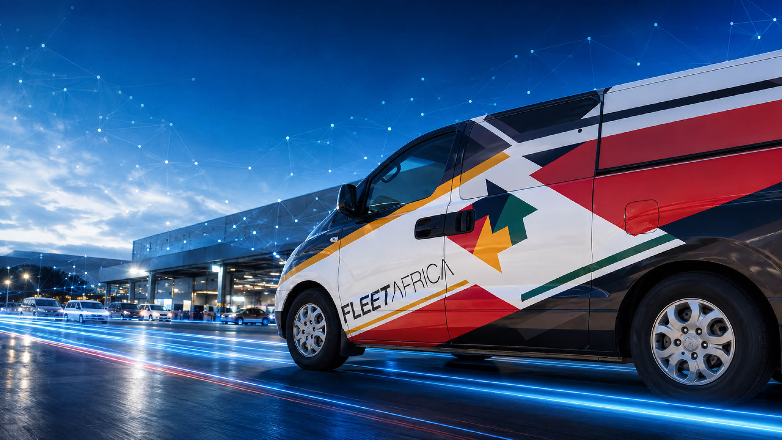 A Fleet Africa liveried van outside a vehicle depot at dusk.